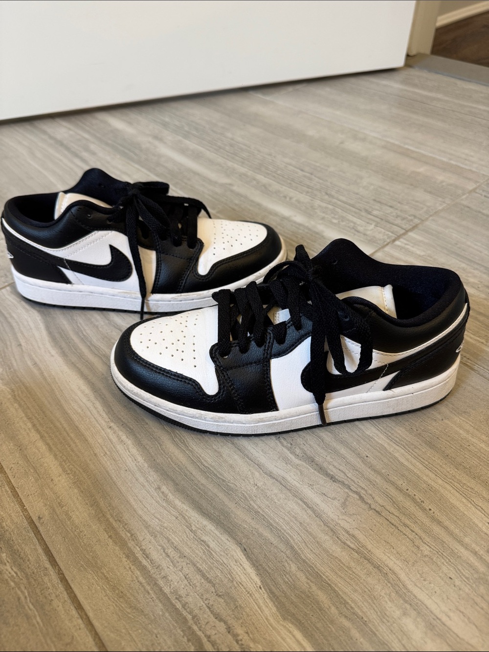 Nike Low-Top Panda Jordan Sneakers in Black and White Leather